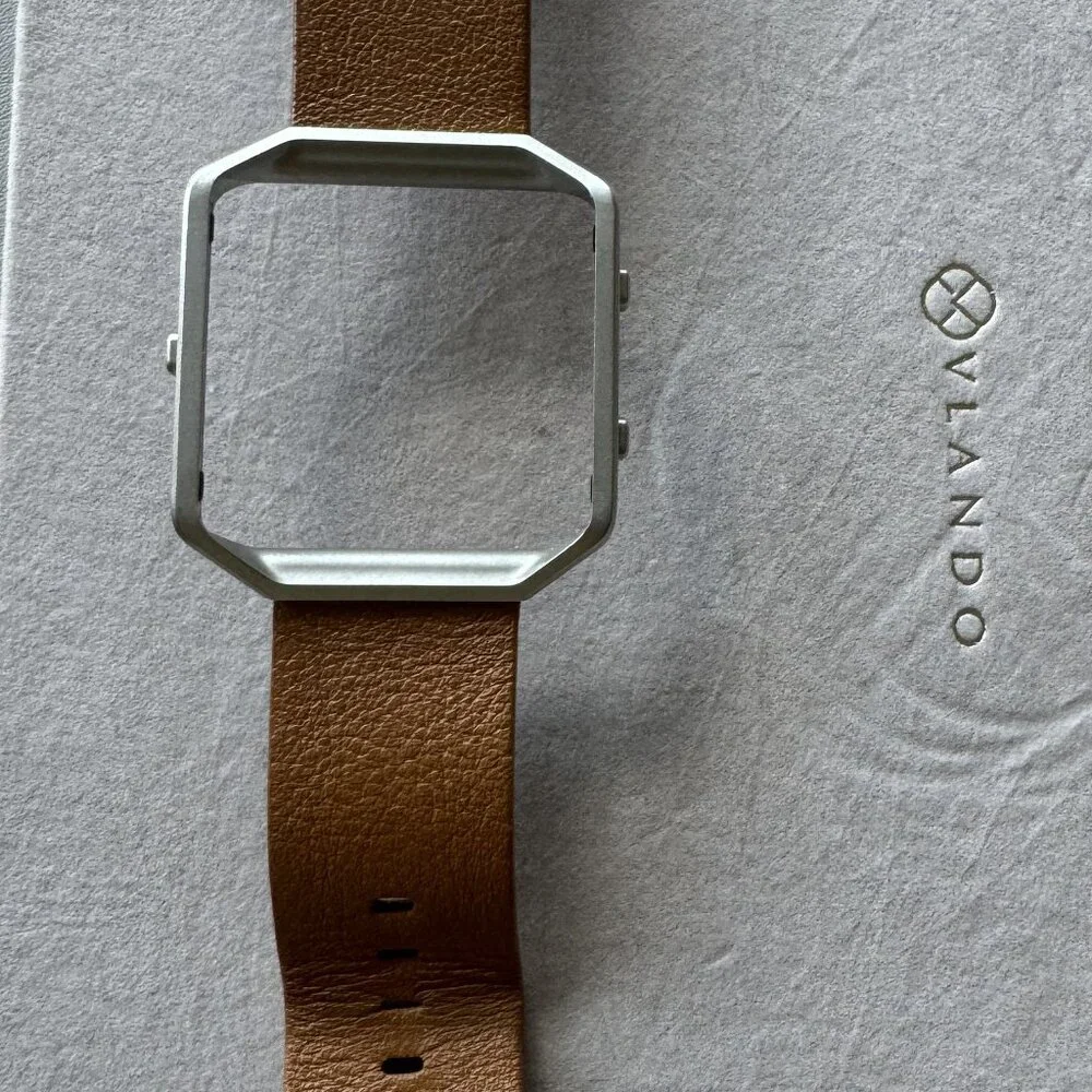 Fitbit brown leather accessory band and frame with original box- size small